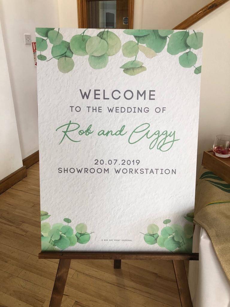 a welcome sign for a wedding ceremony.
