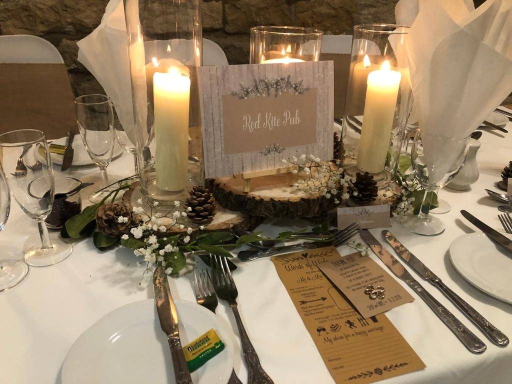 a table with a place setting and place settings.
