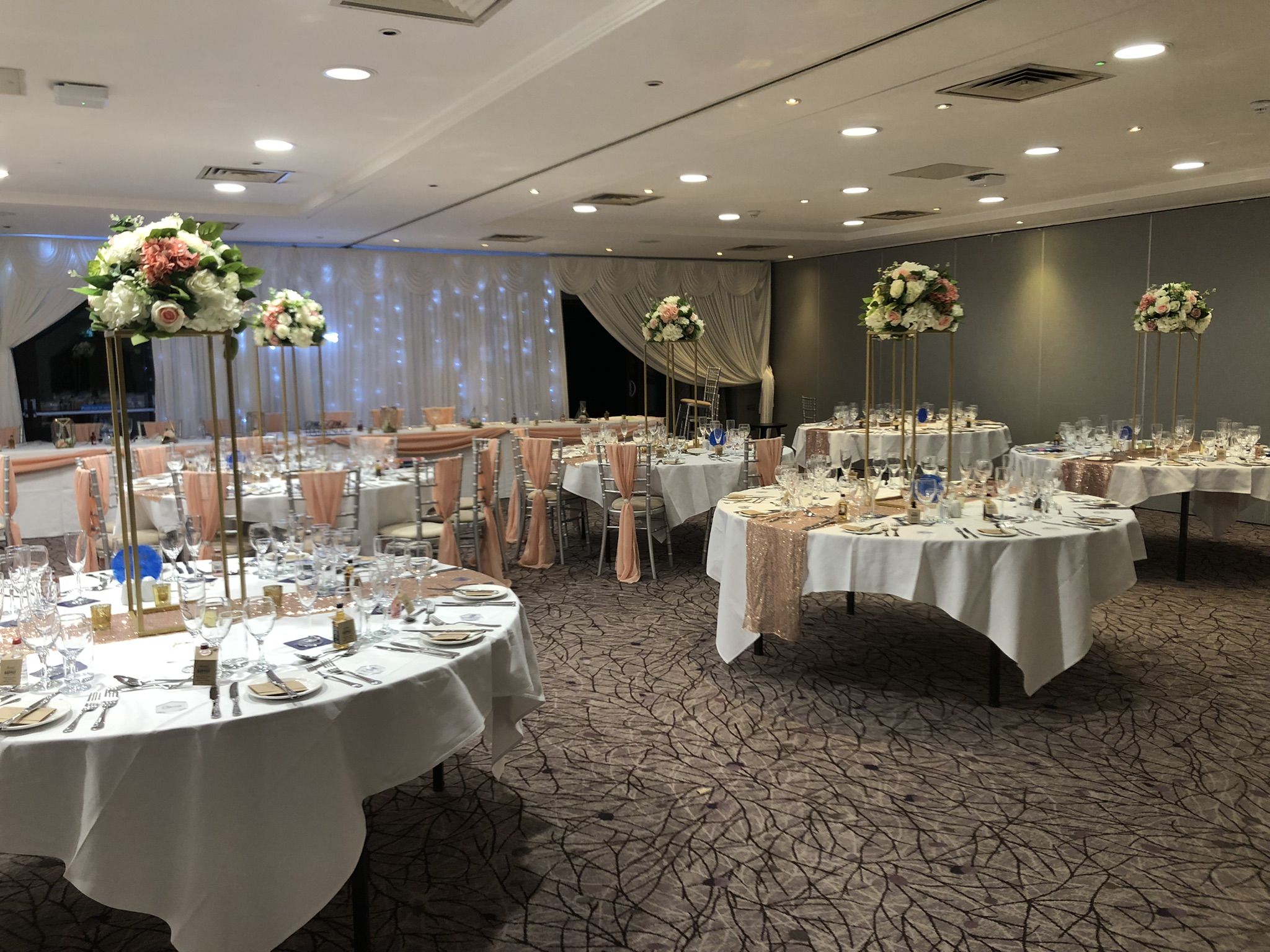 a banquet room set up for a formal function.