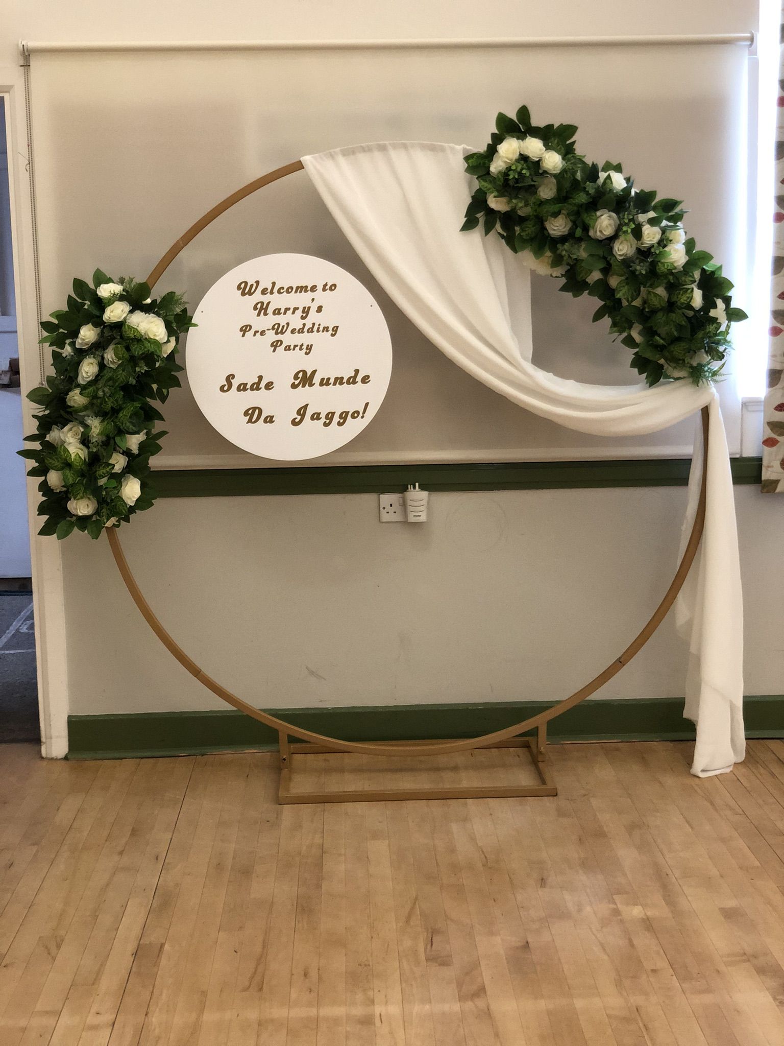 a circle with flowers and a sign that says welcome to the bride.