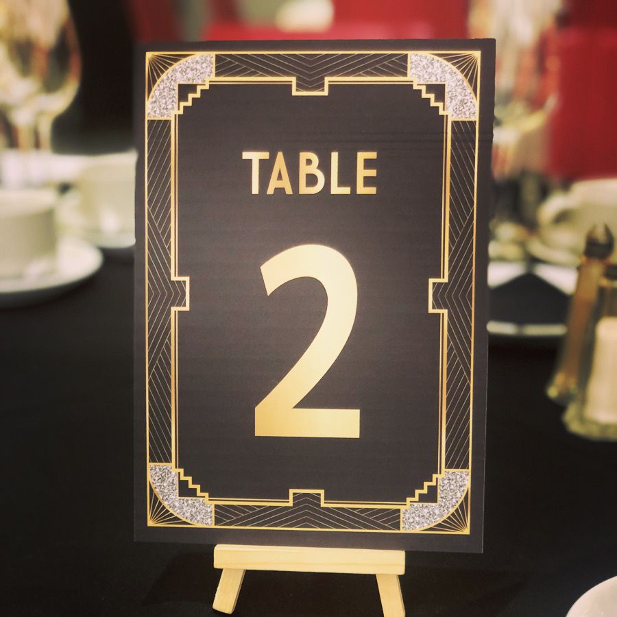 a table number sign sitting on top of a table.