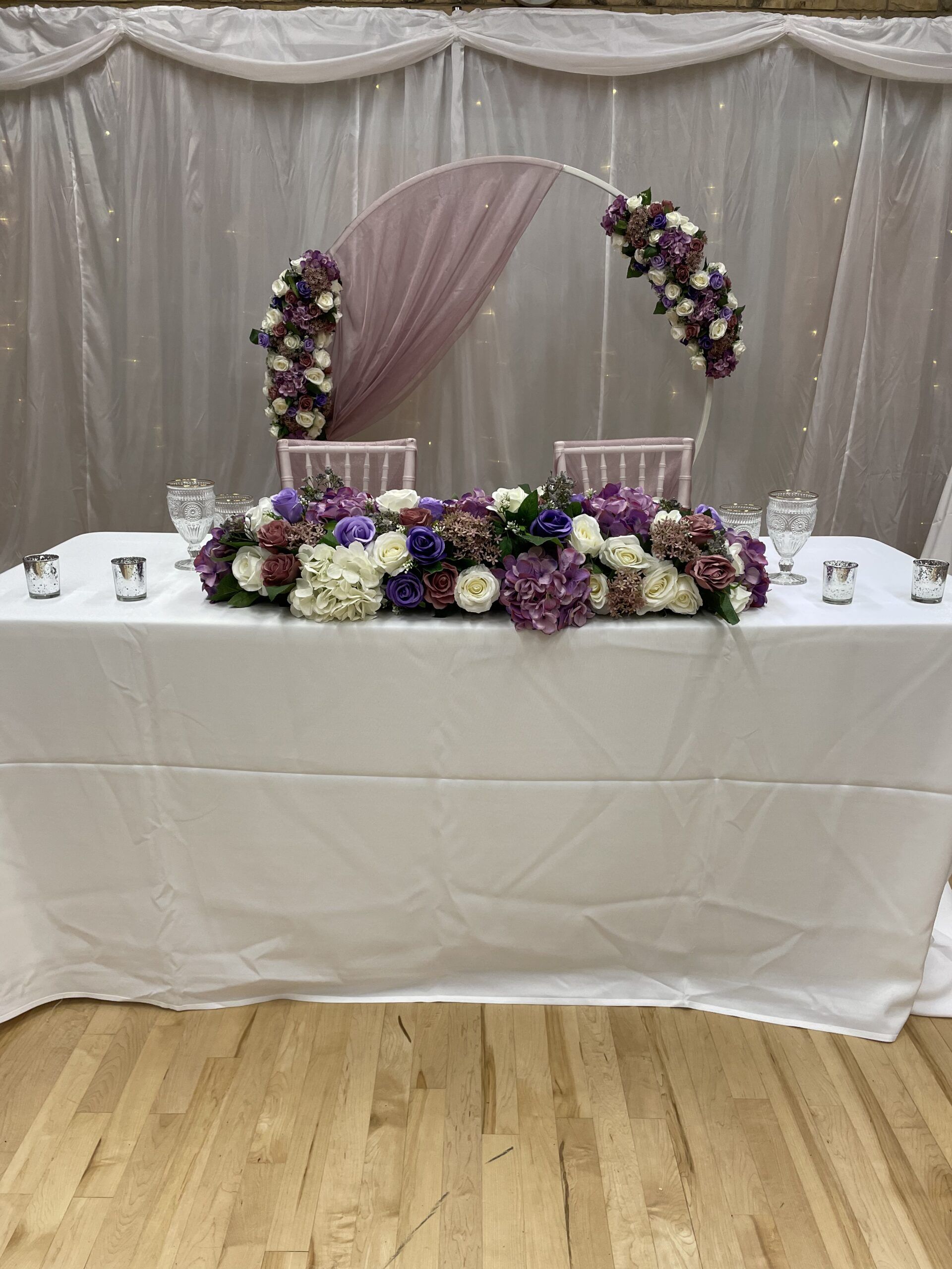 a white table topped with a white table cloth.