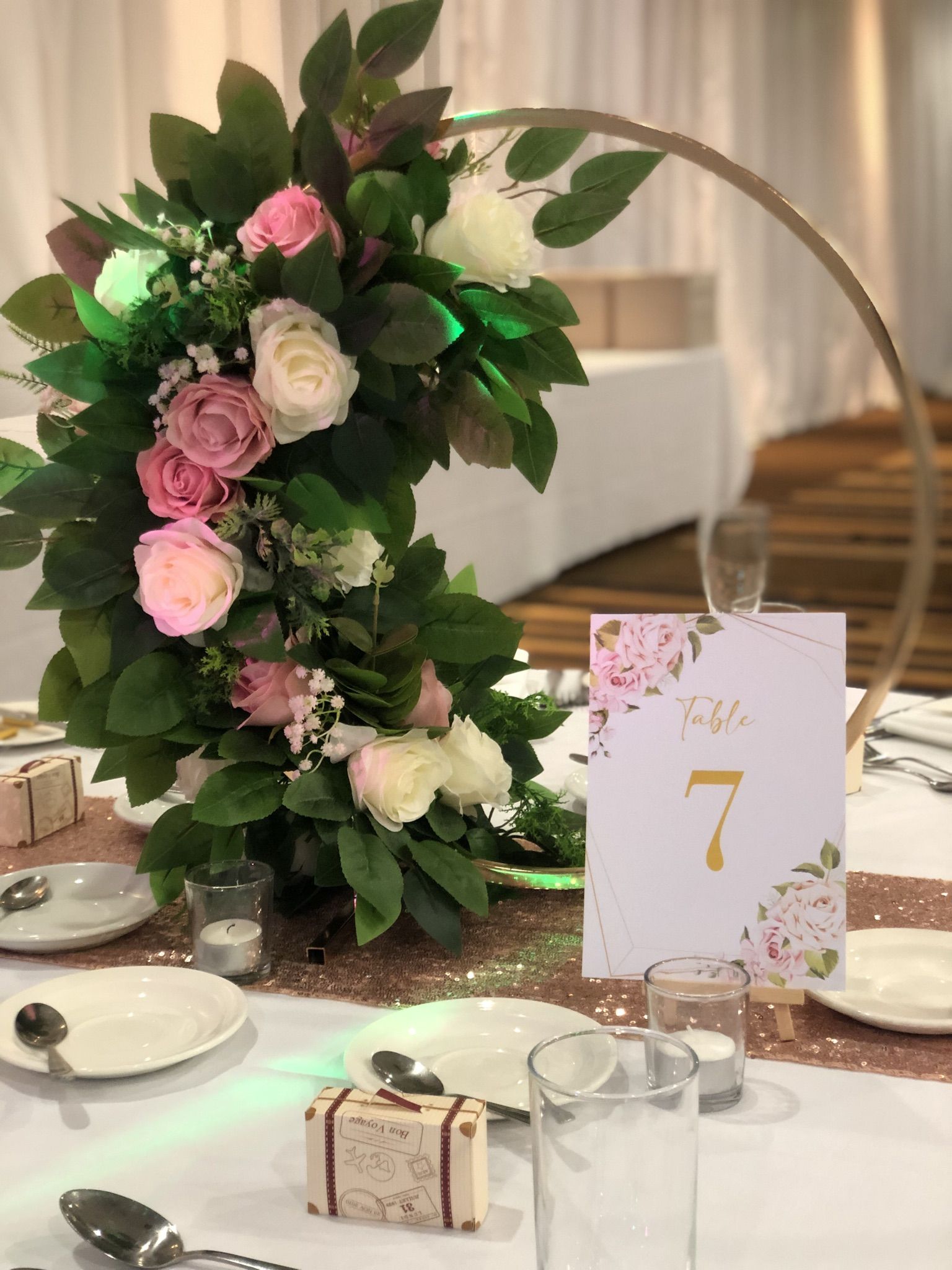 a table is set with flowers and place cards.