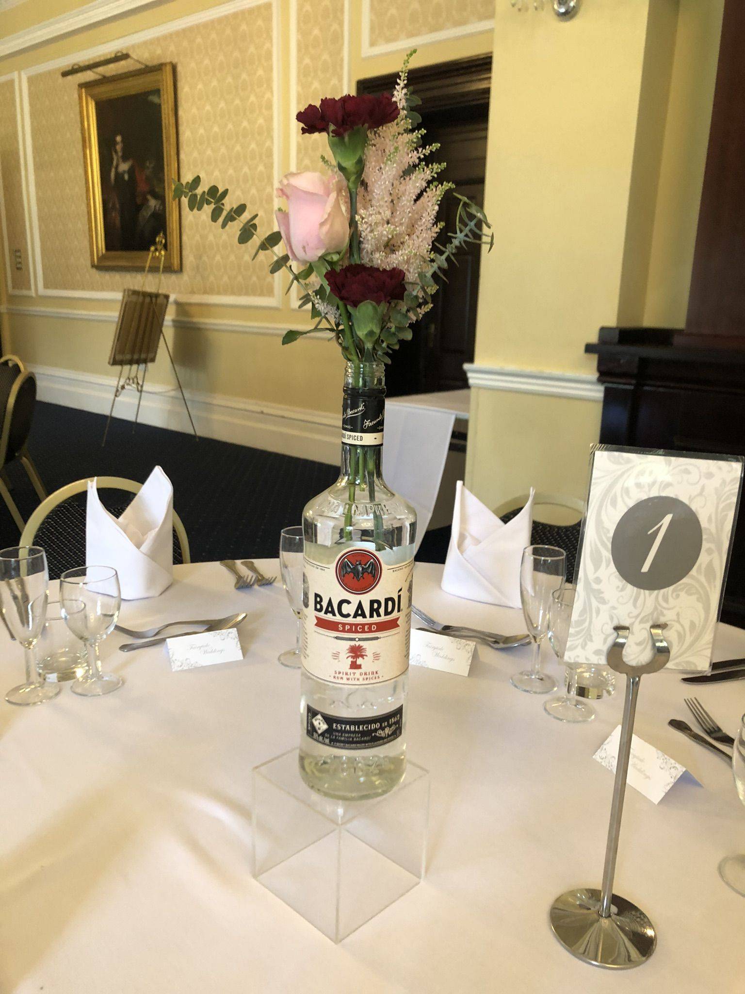 a bottle of bacardi sitting on a table.